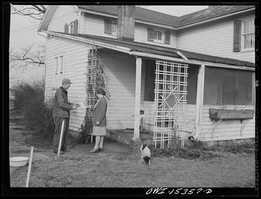 Rio Grande, Ohio. Mr. and Mrs. Younkers, former Kentucky farmers, in front of their new home on Fred Bower's poultry farm