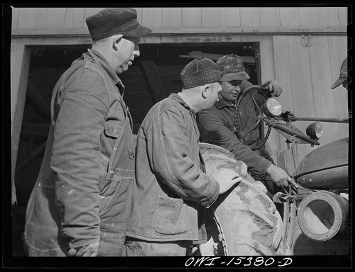 Untitled photo, possibly related to: Rio Grande, Gallia County, Ohio. Vinton Kerr (on the tractor), a local farmer hired to instruct farm labor trainees at Rio Grande College