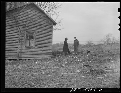 Rio Grande, Gallia County, Ohio. Mr. Bailey, FSA (Farm Security Administration) county supervisor, visiting Reed Hall on his unproductive farm in the hill section of this county. Mr. Bailey is attempting to recruit men from this type of farm for farm labor training and relocation in more productive 