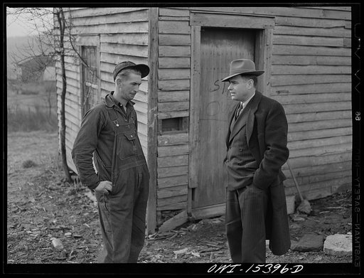 Rio Grande, Gallia County, Ohio. Mr. Bailey, FSA (Farm Security Administration) county supervisor, visiting Reed Hall on his unproductive farm in the hill section of this county. Mr. Bailey is attempting to recruit men from this type of farm for farm labor training and relocation in more productive 