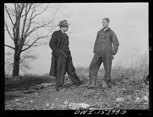 Rio Grande, Gallia County, Ohio. Mr. Bailey, FSA (Farm Security Administration) county supervisor, visiting Reed Hall on his unproductive farm in the hill section of this county. Mr. Bailey is attempting to recruit men from this type of farm for farm labor training and relocation in more productive 