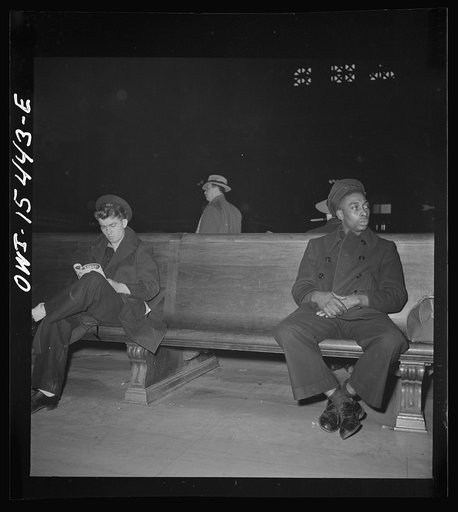 Chicago, Illinois. Sailors waiting for train in the main waiting room of the Union Station