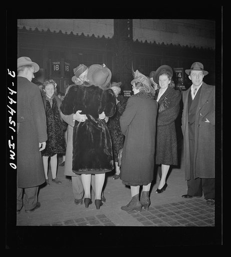 Chicago, Illinois. Soldiers saying goodbye at the train concourse of the Union Station