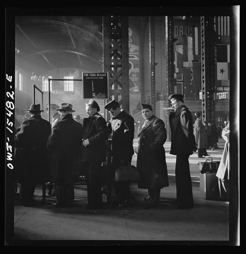 Chicago, Illinois. Lining up for train reservations in the concourse at the Union Station