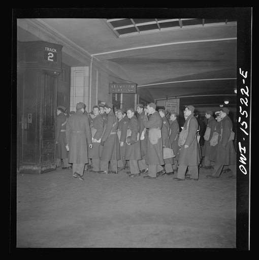 Chicago, Illinois. Soldier in the Union Station going back to camp after a weekend furlough in Chicago