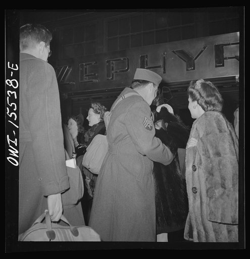 Chicago, Illinois. Soldier saying goodbye in the train concourse at the Union Station