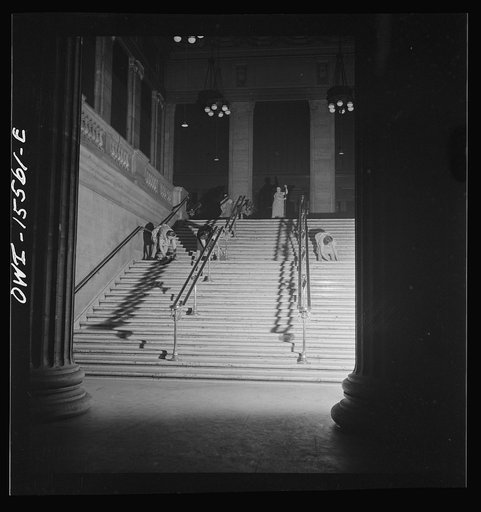 Chicago, Illinois. Scrubwoman at work in the Union Station after midnight