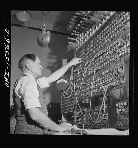Chicago, Illinois. Telegraph switch board of the Pennsylvania railroad in the Pennsylvania telegraph room at the Union Station