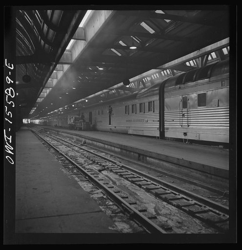 Chicago, Illinois. Unloading express from the Burlington Zephyr train at the Union Station