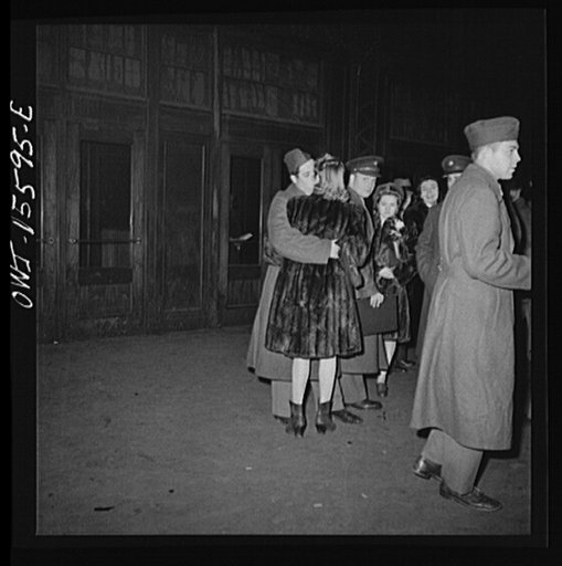 Chicago, Illinois. Soldier kissing his girlfriend goodbye at the Union Station