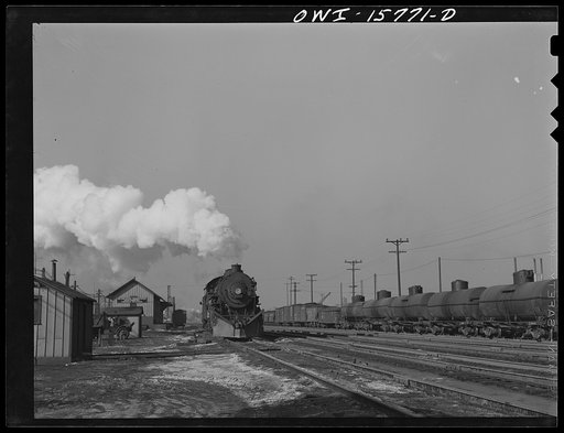 Hammond, Indiana. Locomotive equipped with snow plough on the Michigan Central Railroad tracks
