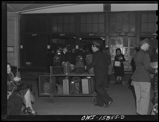 Chicago, Illinois. Redcap with handtruck load of baggage at Union Station