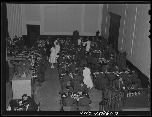 Chicago, Illinois. Soldiers being served dinner in the Fred Harvey restaurant at the Union Station