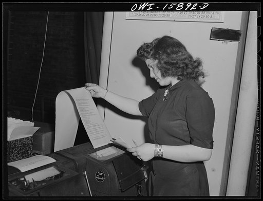 Chicago, Illinois. Teletype machines connect the reservation bureau of the Union Station with the companies' offices in various parts of the country