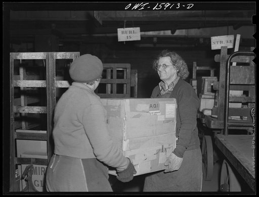 Untitled photo, possibly related to: Chicago, Illinois. The Union Station employs many women in the mail department to handle parcel post packages