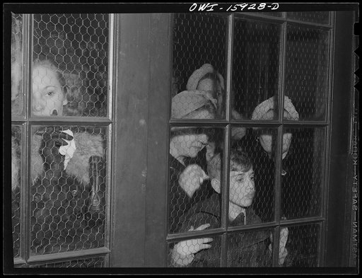 Chicago, Illinois. Watching the soldiers going back to camp at Union Station