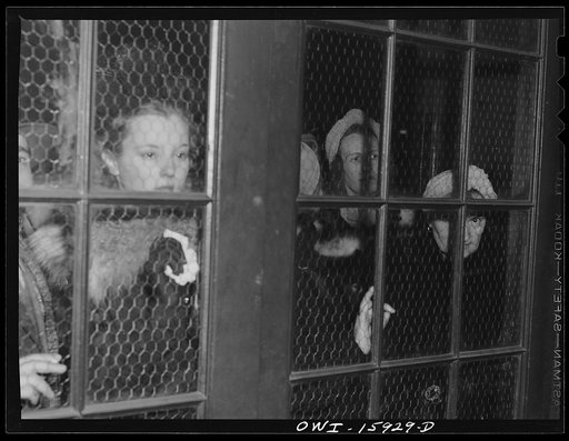 Chicago, Illinois. Watching the soldiers going back to camp at Union Station