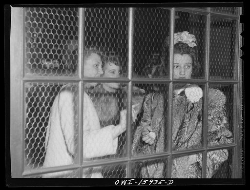 Chicago, Illinois. Watching the soldiers going back to camp at Union Station