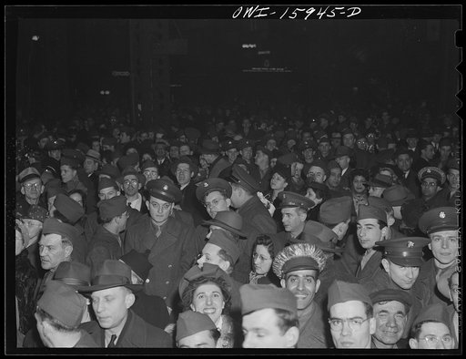 Chicago, Illinois. The Union Station is packed on Sunday night when weekend furloughs and leaves are over. Friends and families seeing the soldiers off for camp again at Union Station