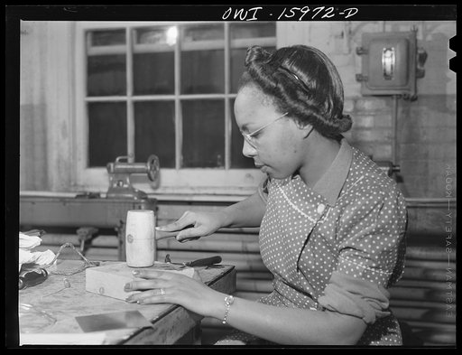 New York, New York. Industrial training for war work offered to women by New York University under United States Government sponsorship. Hammering metal into chain links