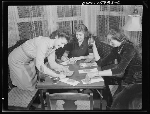 Detroit, Michigan. Girls playing cards and drinking coca cola