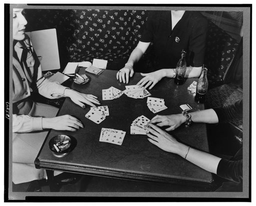Detroit, Michigan. Poker hand and hands of girl players