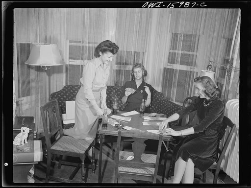 Untitled photo, possibly related to: Detroit, Michigan. Girls playing cards and drinking coca cola