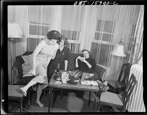 Untitled photo, possibly related to: Detroit, Michigan. Girls playing cards and drinking coca cola
