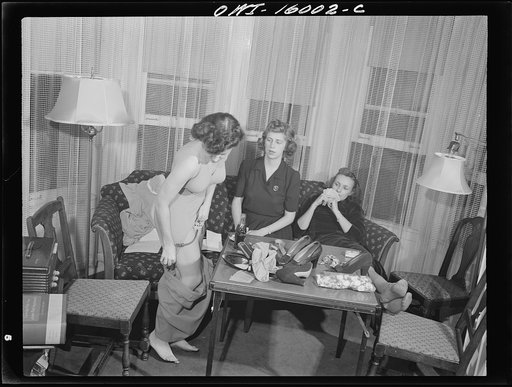Untitled photo, possibly related to: Detroit, Michigan. Girls playing cards and drinking coca cola