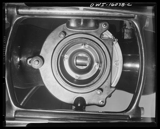 Detroit, Michigan. New method of making x-ray photographs size 4x5 inches instead of larger. Used at the Herman Kiefer Hospital for Communicable Diseases to show various stages of tuberculosis. Front of an x-ray tube apparatus