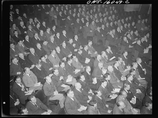 Detroit, Michigan. Audience showing military men and civilians at an early meeting of the Automobile Council for War Production