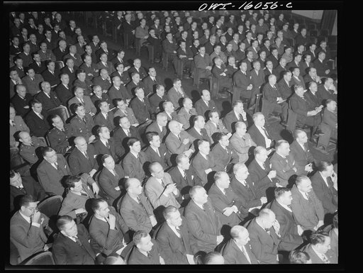 Detroit, Michigan. Faces of typical automobile production men at an early meeting of the Automobile Council for War Production