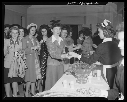 Detroit, Michigan. Style show of clothes worn by better-dressed office workers, presented by the Chrysler Girls' Club of the Chrysler Corporation at Saks Fifth Avenue store. Chrysler girls drinking non-alcoholic punch