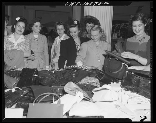 Detroit, Michigan. Chrysler girls shopping for pocketbooks following a style show presented by the Chrysler Girls' Club of the Chrysler Corporation at Saks Fifth Avenue store