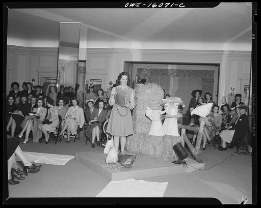 Untitled photo, possibly related to: Detroit, Michigan. Style show of clothes worn by better-dressed office workers, presented by the Chrysler Girls' Club of the Chrysler Corporation at Saks Fifth Avenue store