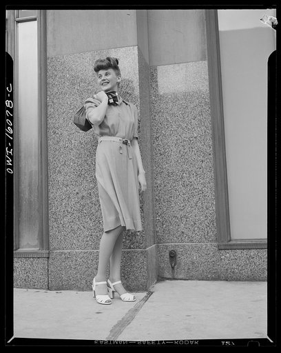 Detroit, Michigan. Style show of clothes worn by better-dressed office workers, presented by the Chrysler Girls' Club of the Chrysler Corporation at Saks Fifth Avenue store