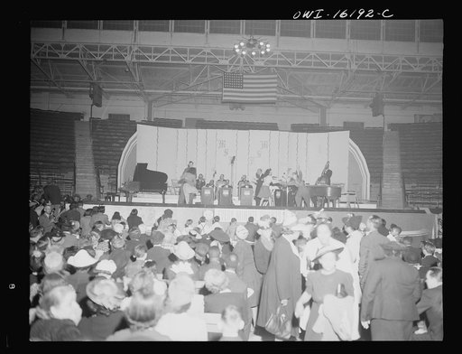 Detroit, Michigan. Jitterbug dancing as part of the entertainment at a scrap salvage rally sponsored by the Work Project Administration (WPA) at the state fairgrounds
