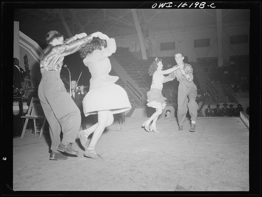 Detroit, Michigan. Jitterbug dancing as part of the entertainment at a scrap salvage rally sponsored by the Work Projects Administration (WPA) at the state fairgrounds