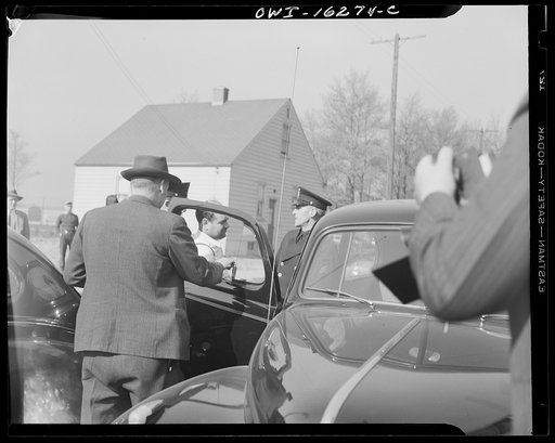 Detroit, Michigan. Riot at the Sojourner Truth homes, a new U.S. federal housing project, caused by white neighbors' attempt to prevent Negro tenants from moving in. Arrested white real estate operator who had been inciting the riot