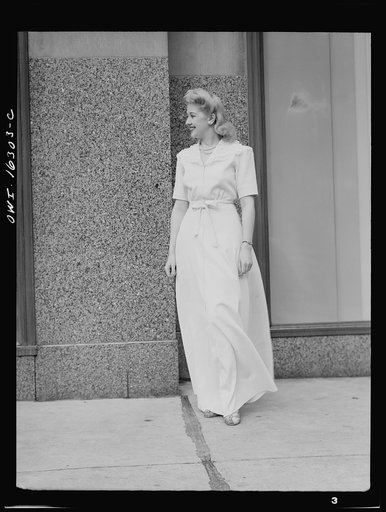 Untitled photo, possibly related to: Detroit, Michigan. Style show of clothes worn by better-dressed office workers, presented by the Chrysler Girls' Club of the Chrysler Corporation at Saks Fifth Avenue store
