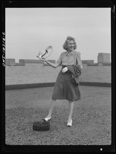 Untitled photo, possibly related to: Detroit, Michigan. Fashion show presented by the Chrysler Girls' Club of the Chrysler Corporation at Saks Fifth Avenue store. Typical American girl