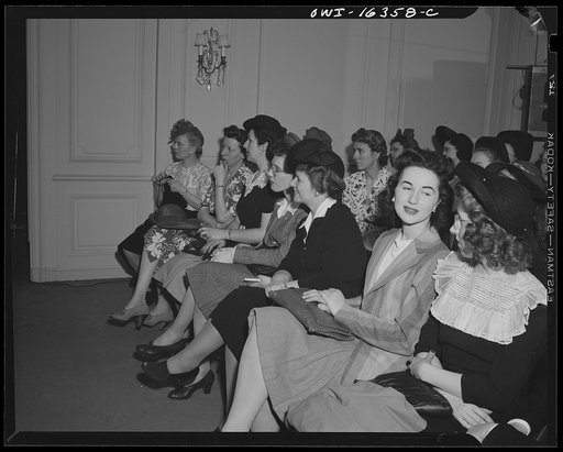 Untitled photo, possibly related to: Detroit, Michigan. Style show of clothes worn by better-dressed office workers, presented by the Chrysler Girls' Club of the Chrysler Corporation at Saks Fifth Avenue store