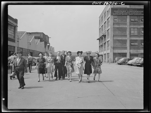 Detroit, Michigan. Girls coming out of the Highland Park Chrysler plant
