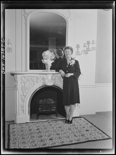 Untitled photo, possibly related to: Detroit, Michigan. Fashion show presented by the Chrysler Girls' Club of the Chrysler Corporation at Saks Fifth Avenue store. Girl modeling brassiere and pantie girdle