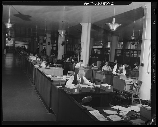 Detroit, Michigan. Men and women office workers at the Chrysler Corporation