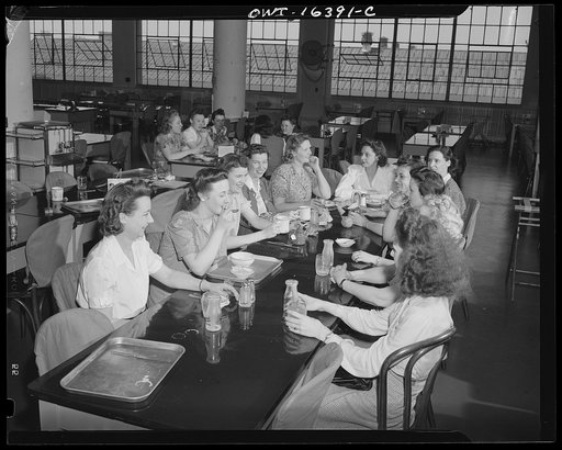 Detroit, Michigan. Office workers eating lunch in the cafeteria at the Chrysler Corporation