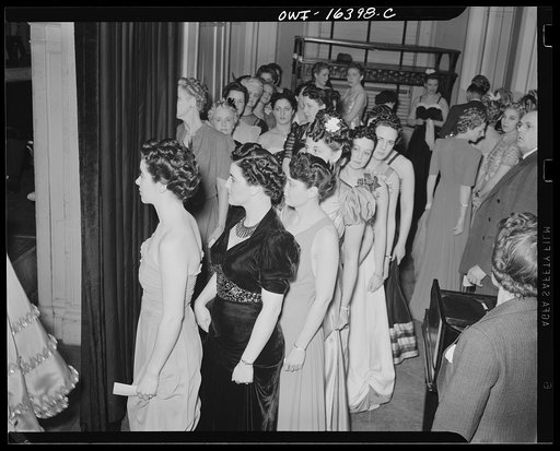 Untitled photo, possibly related to: Detroit, Michigan. Girls in formal clothes at a hair styling show