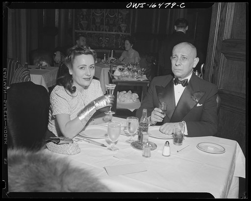 Detroit, Michigan. Erich Von Strohein [i.e. Stroheim] and a girlfriend eating dinner on New Year's night