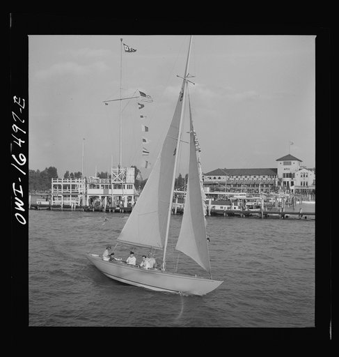 Detroit, Michigan. A Venetian night party at the Detroit yacht club, whose members represent the wealthier class of manufacturers and their friends. Sailing boat
