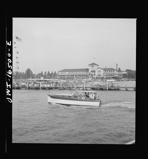 Detroit, Michigan. A Venetian night party at the Detroit yacht club, whose members represent the wealthier class of manufacturers and their friends. Small cabin crusier